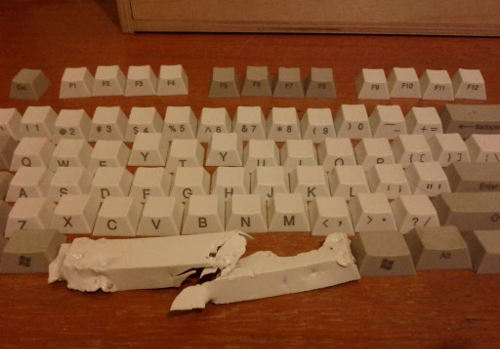 A keyboard with a broken space bar