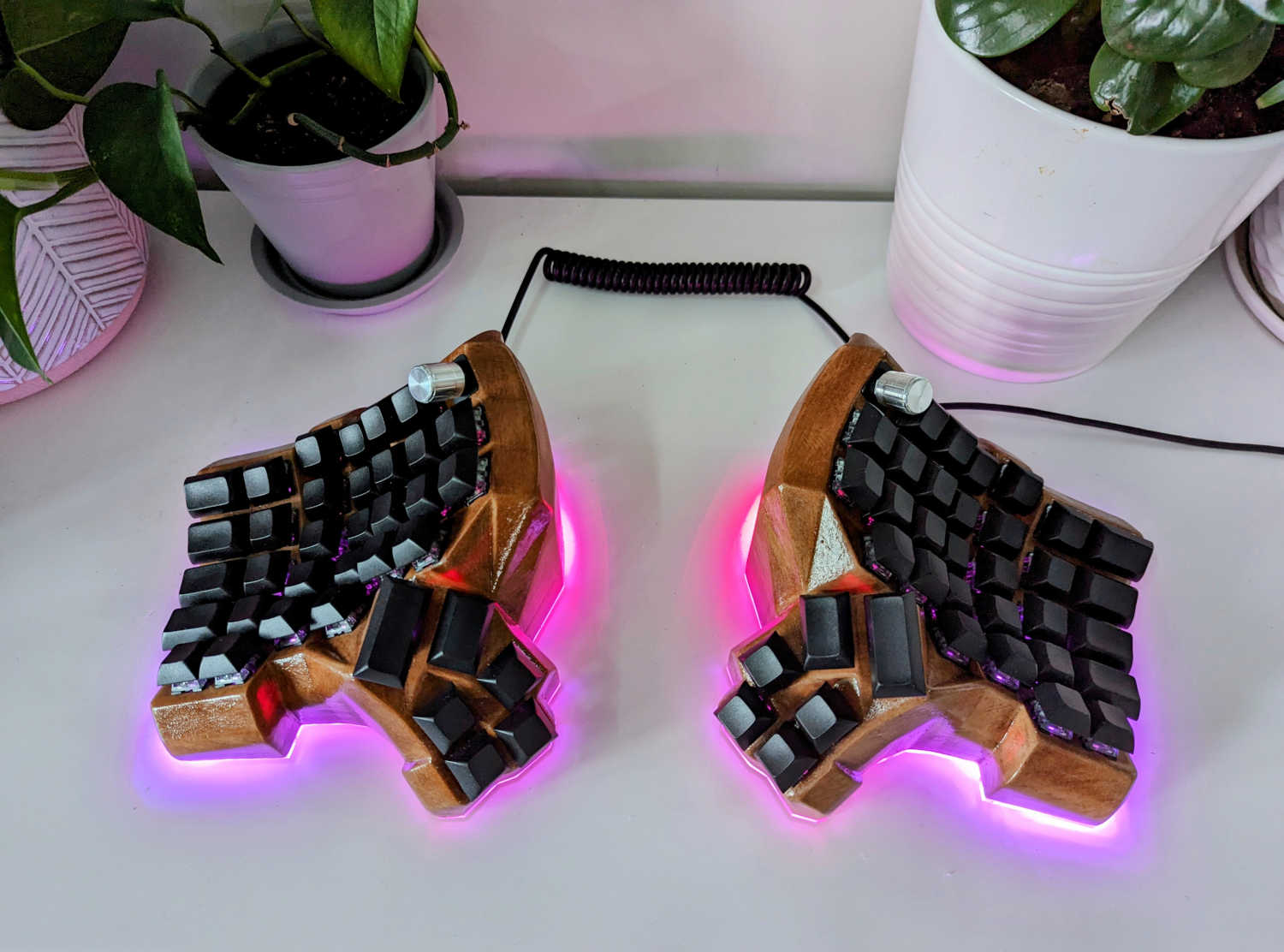 Another picture of the finished keyboard, with pink underglow